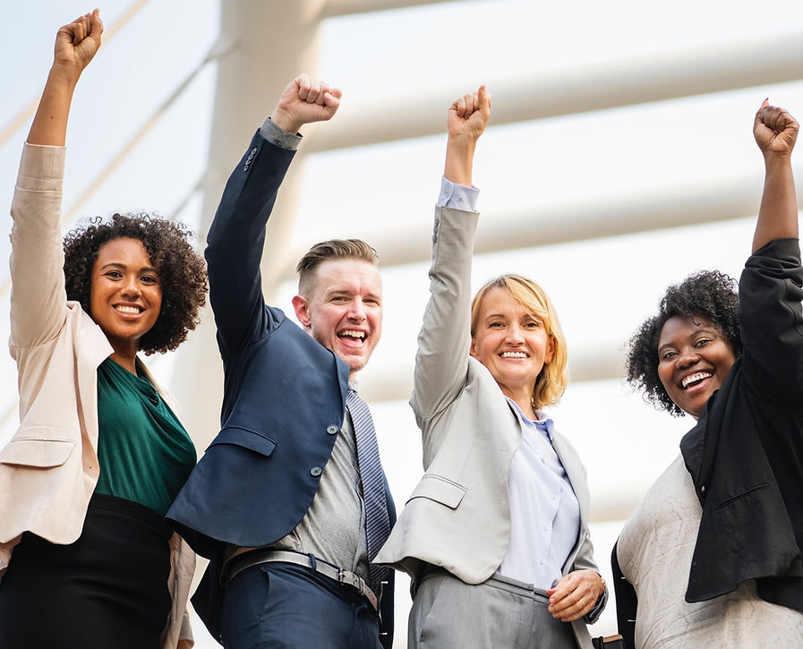 Happy men & women expressing their success while raising one arm in the air