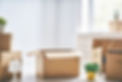 cardboard-boxes-in-room-944102938-da1472