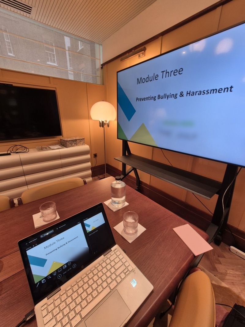 Module Three, Preventing Bullying and Harassment, on screen before an in-person session