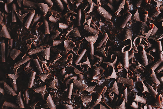 closeup-tasty-chocolate-cake-with-chocolate-chunks-baking-sheet-closeup.jpg