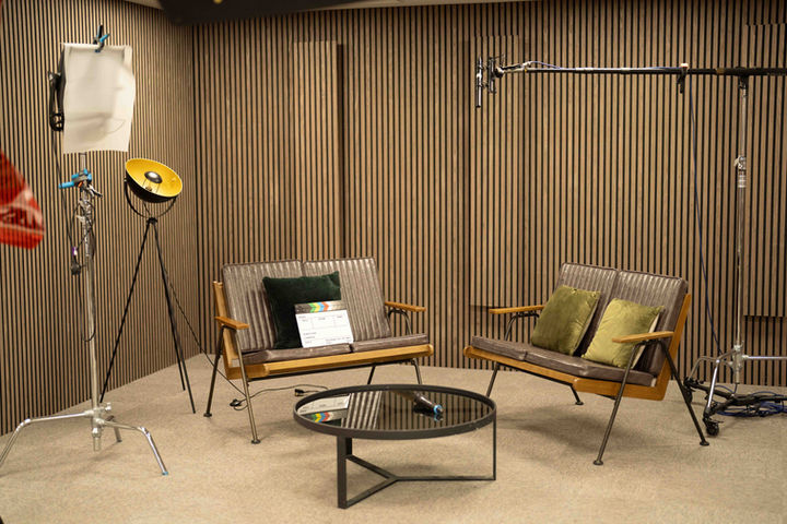 Cambridge Podcast Studio recording room with podcast seating and microphones