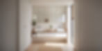 Minimalist bathroom winth cabinets and shelves painted in white color.jpg