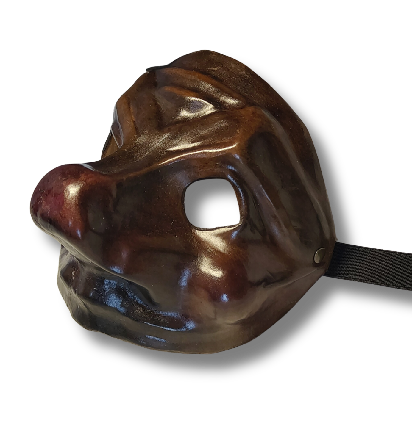 Traditional leather mask of Brighella Capitano, an emblematic character from the commedia dell'arte. Italy Italia Italie