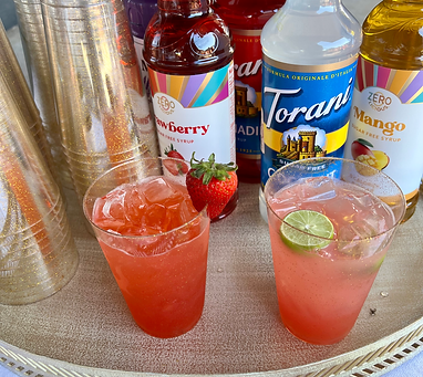 Licensed bartender serving cocktails at Norman OK event