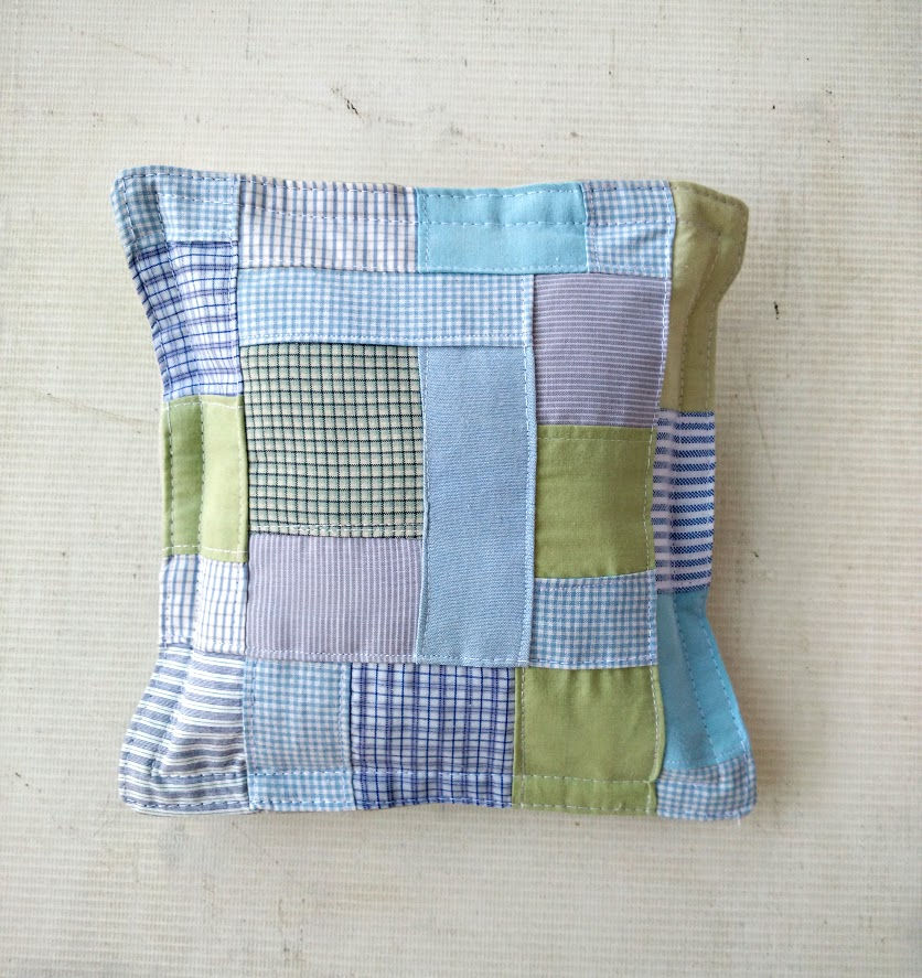 Thumbnail: small blue patchwork pillow