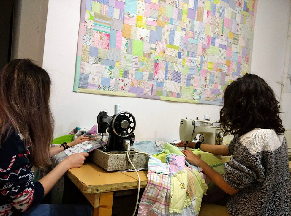 children sewing on sewing machines