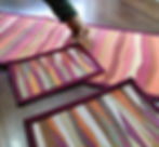 3 wave landscape patchwork piece in autumn colors being laid out on a table