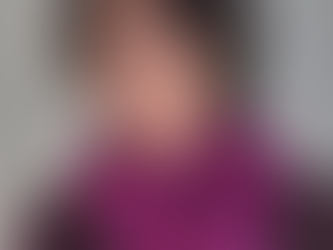 Woman wearing fuschia colored t shirt scarf