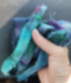 hens of tie dyed shirts to be unpicked
