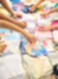 Chidren choosing fabric squares for their rag quilts