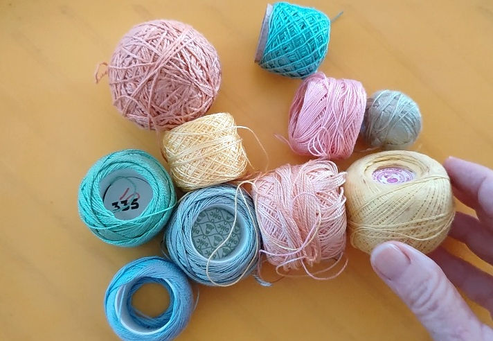 spools of upcycled spring colroed sewing threads