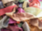 Autumn colored fabric scraps in a pile