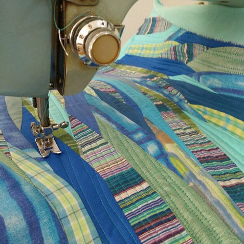 sewing a quilt on a sewing machine