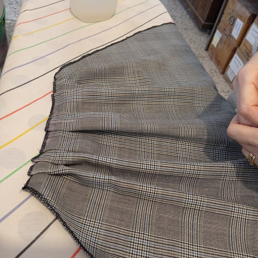 Pinning and ironing the pleats