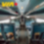 the centre aisle of a passenger train car with seats on either side