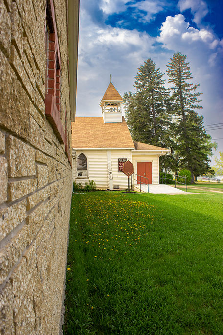 Exterior of the church building from the side looking toward the main entrance.