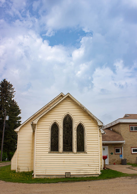 Christ Church Building, sanctuary with stained glass view.