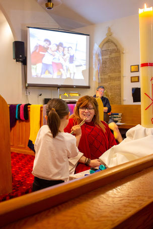 The Rev. Jann leading the Kids' Time during a Sunday service.