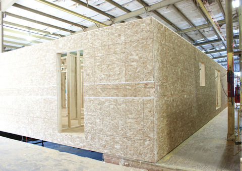 Exterior 7/16" OSB sheathing glued and stapled.