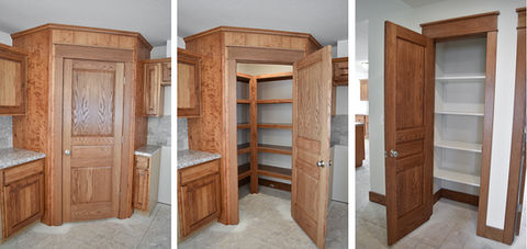 Astoria II kitchen has wood-wrapped corner pantry and pantry closet. 