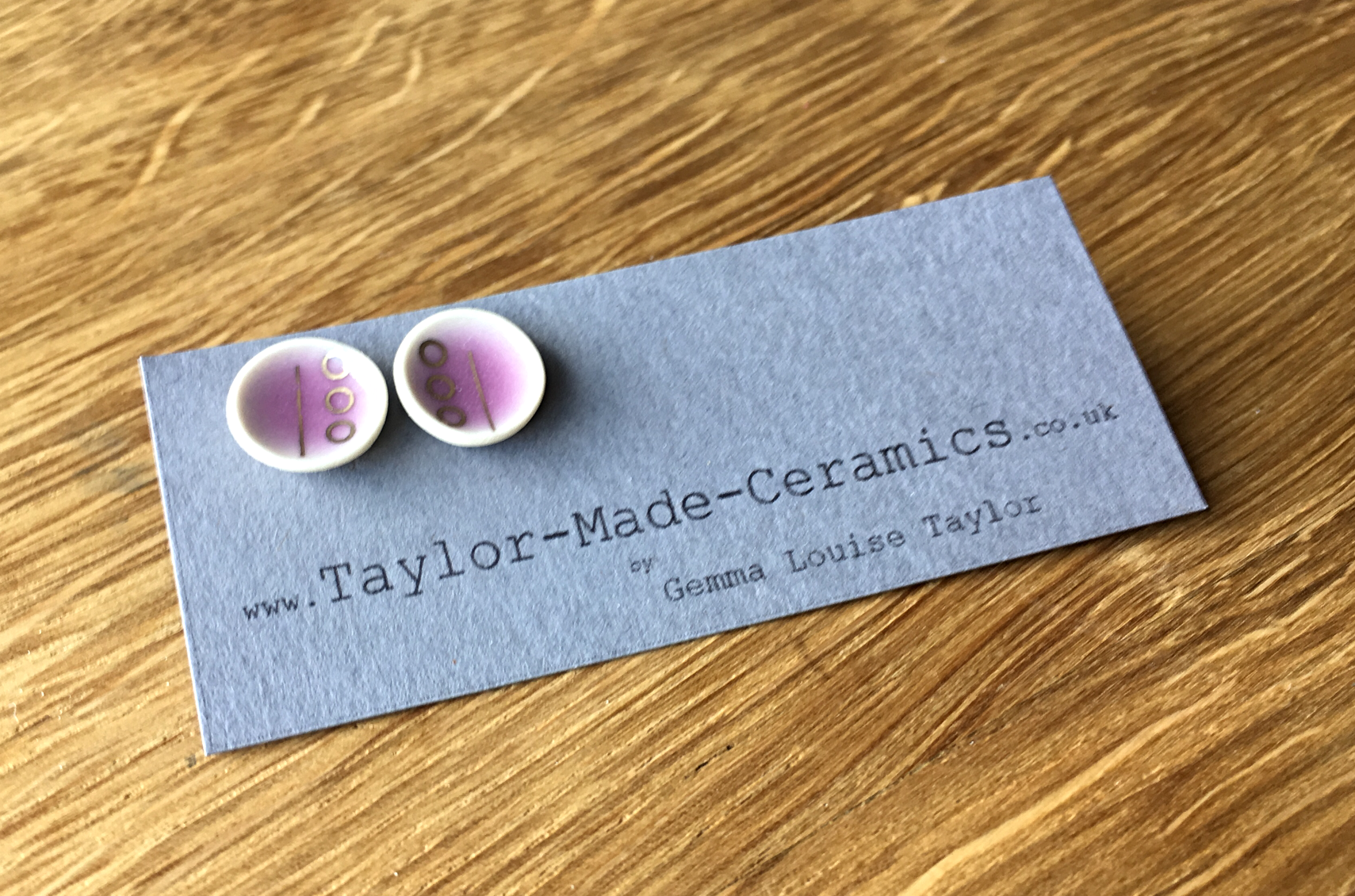 Ceramic Pink Gold decorated dish shaped earrings.