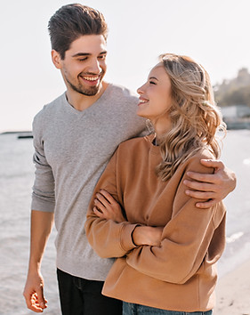 pleasant-young-man-embracing-girlfriend-nature-outdoor-portrait-pleased-blonde-girl-posing