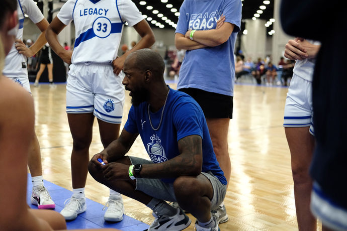 Coach Teejay giving a mid-game pep-talk