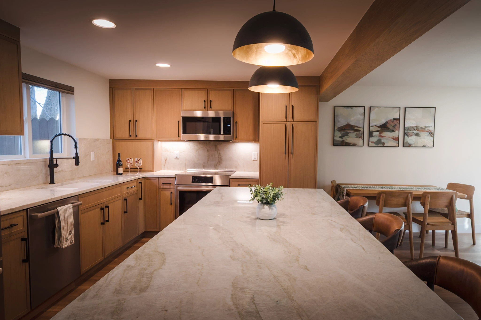 Modern kitchen with large island and dining area