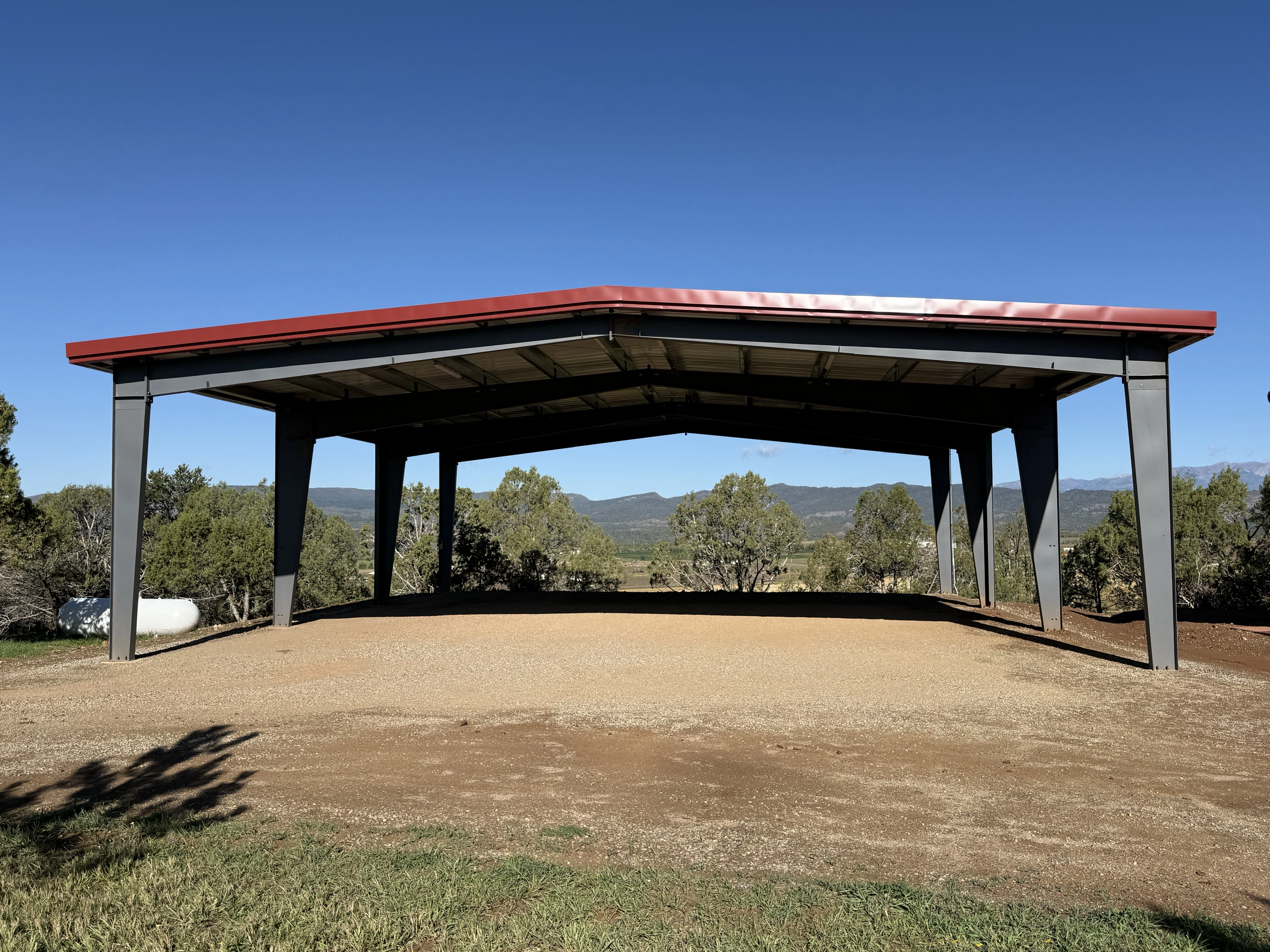 Red-roofed metal storage building
