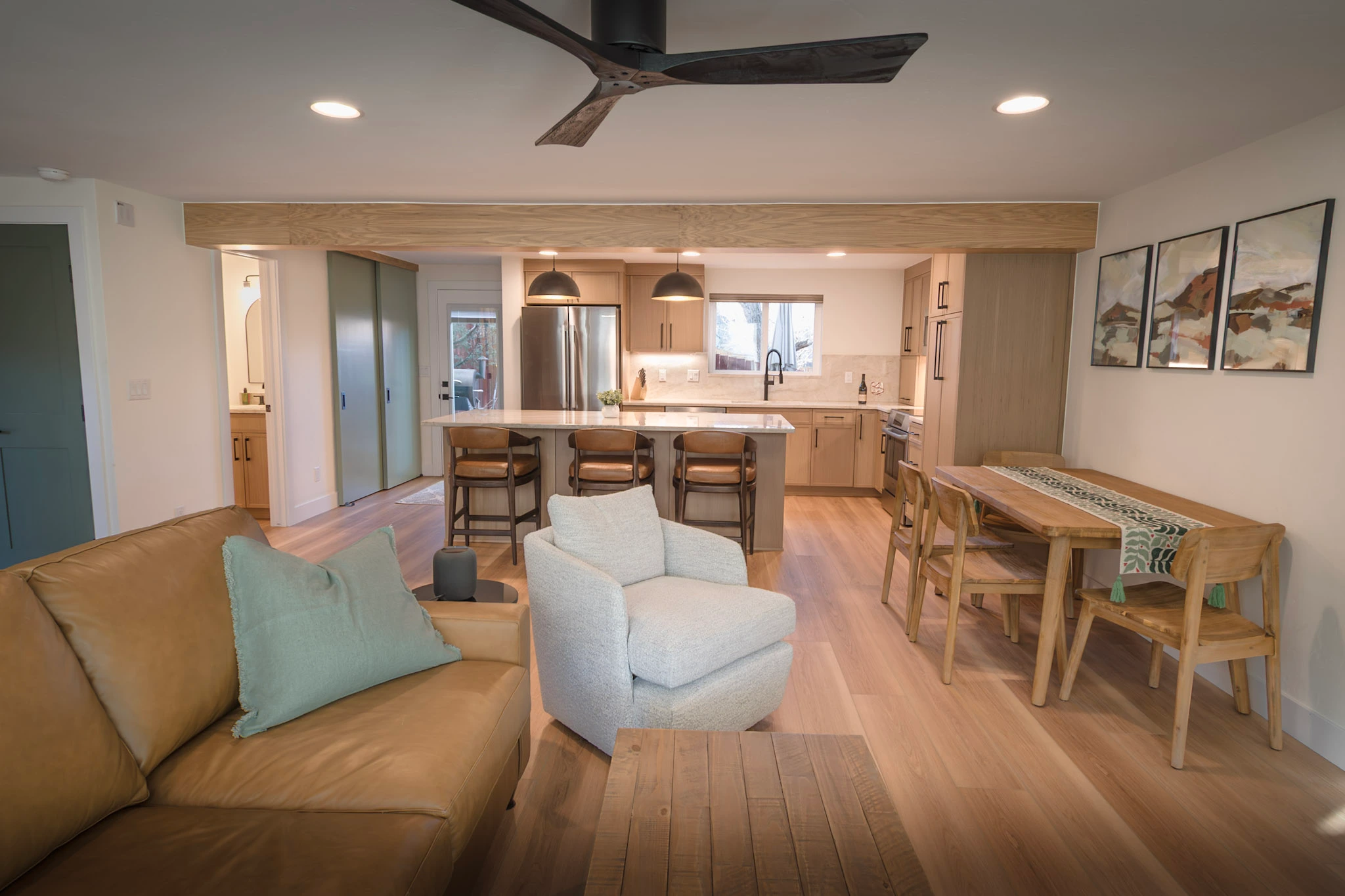 Open plan living room, dining area, and kitchen