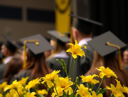 HIGH SCHOOL GRADUATION YELLOW FLOWERS ON STAGE.jpg