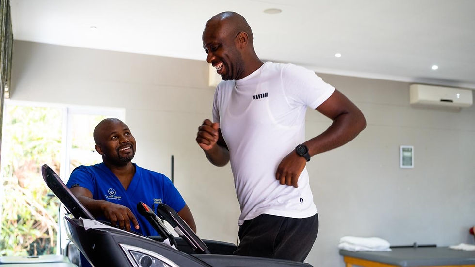 Athlete running on treadmill at physiotherapist