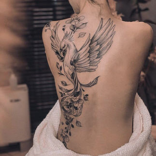 women’s back tattoos