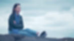 Eleanor Gray in How Deep Is the Ocean improvised film sitting on the beach
