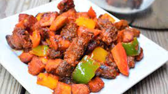 Well Spiced GOAT MEAT with a side