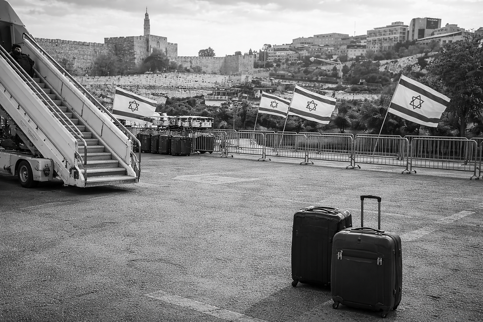 Empty tarmac with Jerusalem backdrop.png