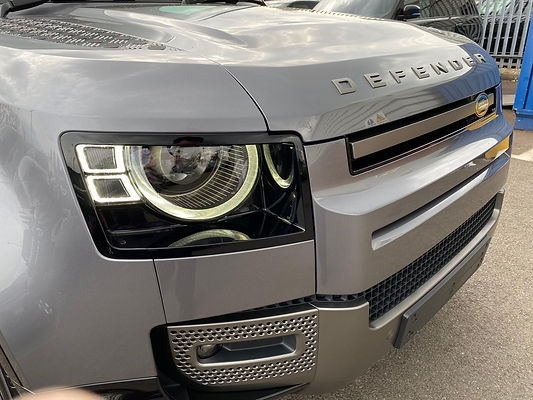 Front of a silver Land Rover Defender