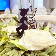 Centerpiece - flowers, greenery and fairies