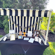 Black and white awning on a table for High School Graduation
