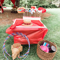 Circus party décor with striped details and classic fair-style accents