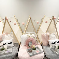 gymnastics team sleepover with spa theme and cozy tent setups