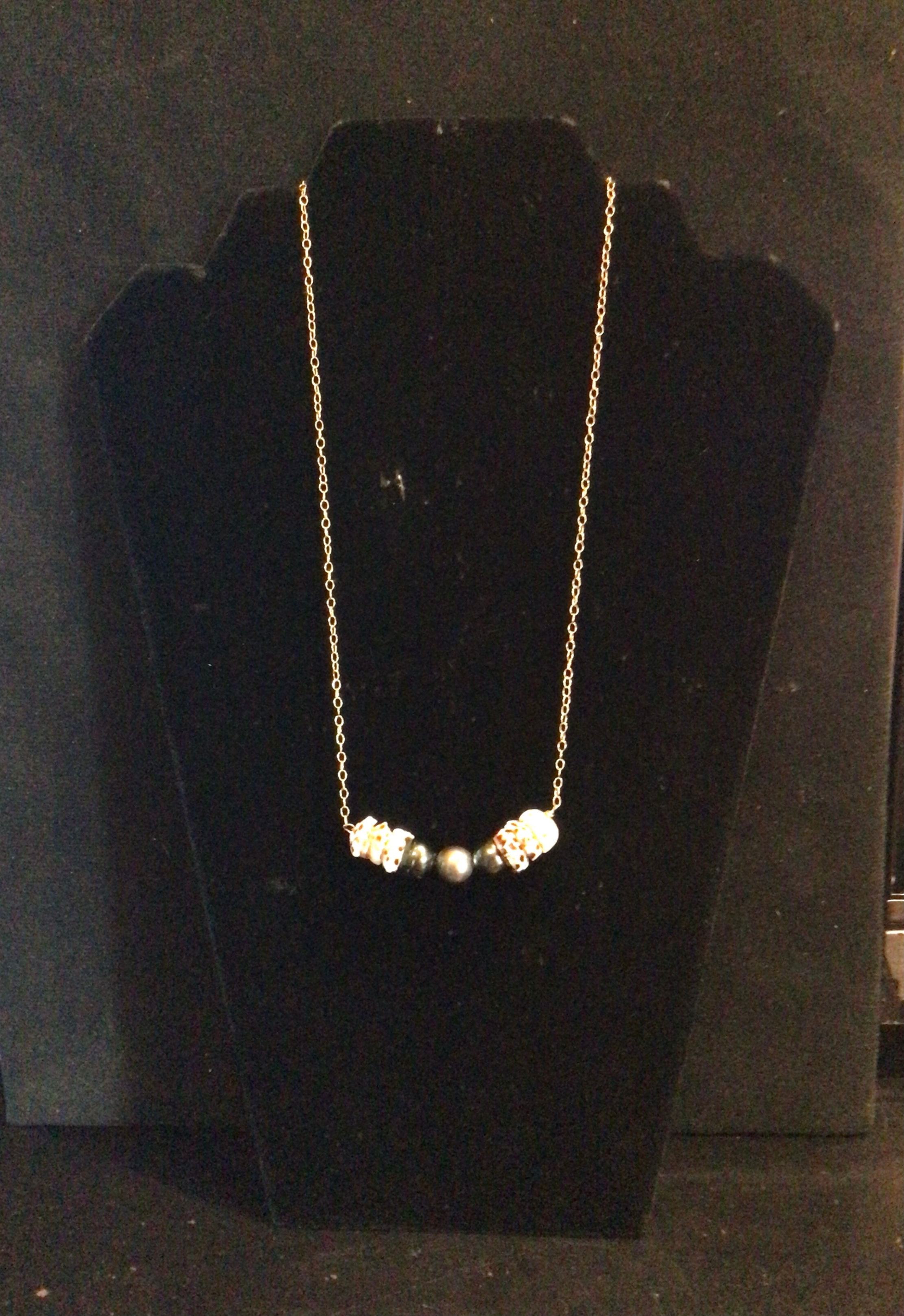 Tahitian pearl and puka shell gold necklace 