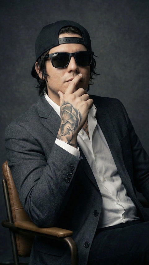 Jeff Schuette, also known as Jeff Shooty, entrepreneur and CEO of FakeTattoos.com, pictured in professional attire with a confident, approachable demeanor for personal branding and online portfolio.