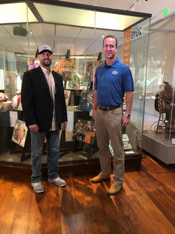 Peyton Manning with his portrait
