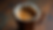 Close-up view of South Indian filter coffee in a traditional metal tumbler