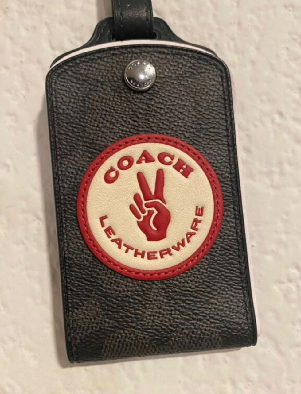 Thumbnail: TAG de Maleta Coach - Pieza Especial 'Peace Sign'