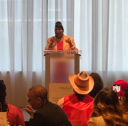 Denise speaking at the Gospel Brunch.jpg