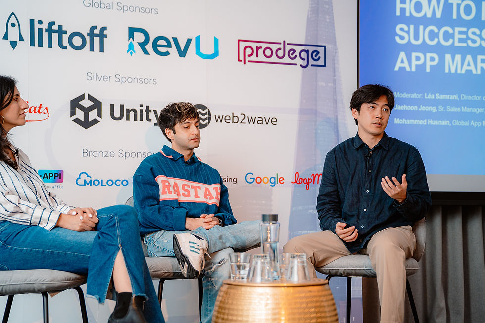 Panel discussion with three speakers on stage at Appsforum London