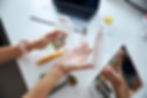 A woman working on product formulations for her skincare company.