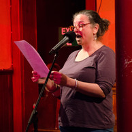 Woman reads to audience